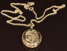 A 9ct gold locket with engraved decoration (5cm), on 9ct gold chain, 16.7g, 54cm