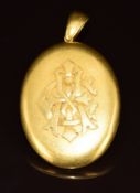 Victorian yellow metal locket with raised initial decoration, 34.6g, 3.6 x 4.8cm