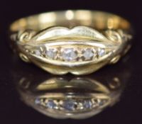 An 18ct gold ring set with diamonds, 2.9g, size L