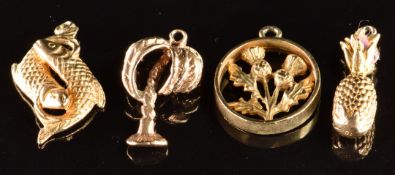 Four 9ct gold charms comprising fish, pineapple, thistle and palm tree, 10.5g