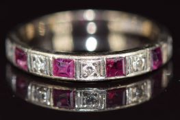 Art Deco 18ct white gold half eternity ring set with calibre cut rubies and diamonds, 2.3g, size K