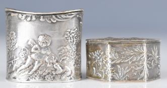 Two Dutch silver trinket or similar boxes with embossed decoration, both with Dutch silver marks and