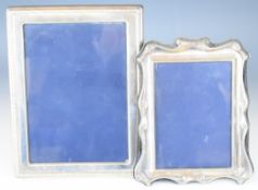 Two hallmarked silver photograph frames, the larger to suit 7 x 5 inch photo, Sheffield 1988,