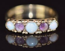 A 9ct gold ring set with three opals and two amethysts, 3.1g, size N