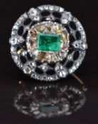 Georgian 9ct gold and silver brooch set with a foiled emerald of approximately 0.7ct and rose cut