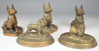 Two Brian Elton bronze coloured models of dogs together with three further similar models of dogs,