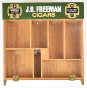 J.R.Freeman Cigars retail shop counter top display box with perspex lid over a series of