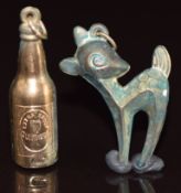 Two 9ct gold charms, one in the form of a bottle of Guinness and the other a fawn, 2.7g