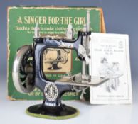 Singer child's working sewing machine 'A Singer For The Girls - Teaches them to make clothes for