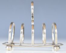 George V hallmarked silver five bar toast rack raised on ball feet, Birmingham 1922, maker