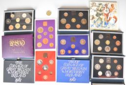 Seven Royal Mint coin sets comprising 1970, 1981, 1982, 1983,1984, 1985 and 1986, together with 1986
