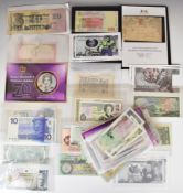 A collection of uncirculated overseas banknotes including USA and Bahamas, also Scottish, Channel