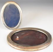 Two oval hallmarked silver photograph frames, the larger Chester 1912, maker J & R Griffin Ltd,