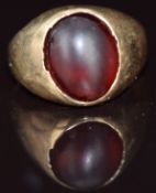 A 9ct gold ring set with a garnet, 2.4g, size E