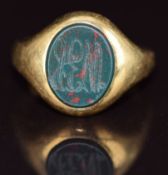 An 18ct gold signet ring set with blood stone, maker C G & S, 7.4g, size J