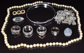 A collection of jewellery including Victorian brooch set with foiled garnets, lava cameo brooch,