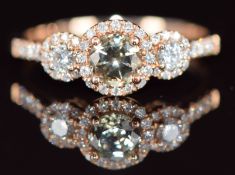 A 14k rose gold ring set with topaz and diamonds in three clusters, 2.6g, size O