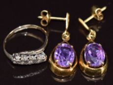 A 9ct gold ring set with five diamonds (2.2g, size M) and a pair of 9ct gold earrings each set