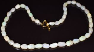 A necklace made up of 42 barrel shaped opal beads, 21.5g, 45cm