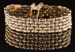 A 9ct gold wide link bracelet, 38.6g, 19.5cm