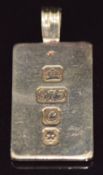 A 9ct gold ingot pendant, 9.3g, 3.3cm
