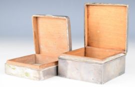 Two hallmarked silver cigarette boxes, one with engine turned decoration to lid, Birmingham 1923,