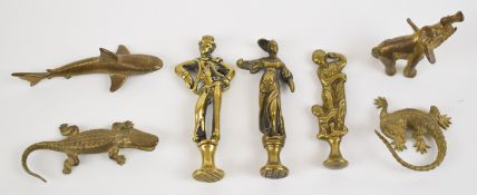 Three 19thC brass figural pipe tampers and four novelty brass animals including a finely cast lizard