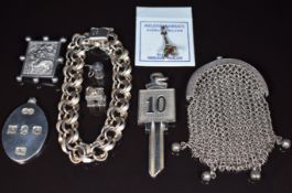 A silver bracelet made up of smooth and textured links, silver Jubilee ingot pendant, Thai silver