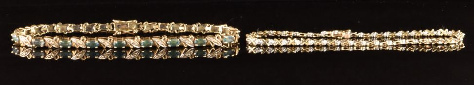 A 9ct gold bracelet set with oval cut sapphires and diamonds and a 9ct gold bracelet set with