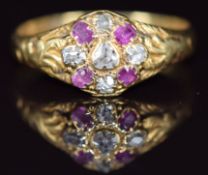 An 18ct gold ring set with pink sapphires and diamonds, London 1868, 2.5g, size N