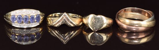 Four 9ct gold rings comprising Russian style wedding band, heart shaped signet ring, V shaped ring