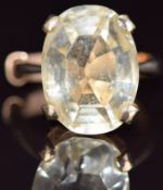 A 9ct gold ring set with an oval cut citrine, 6.5g, size L