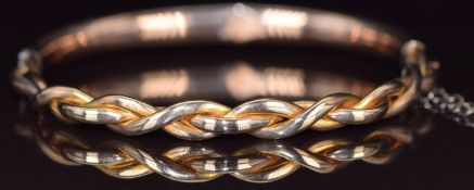 A 9ct rose gold plaited bangle, 8.6g, 5.5 x 5.8cm