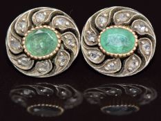 A pair of Victorian earrings each set with an oval cut emerald of approximately 0.4ct surrounded