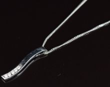 A 9ct white gold pendant set with cubic zirconia, on 9k white gold chain, in box, chain 40cm,