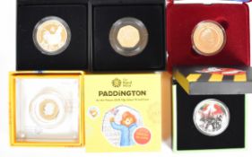 Royal Mint silver proof coins including Lunar Year 1oz, Charles III Coronation 50p, Ghostbusters