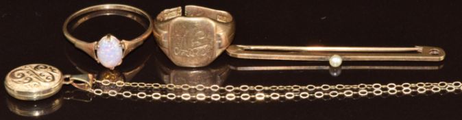 A 9ct gold brooch set with a pearl, 9ct gold signet ring (band cut), 9ct gold ring set with faux