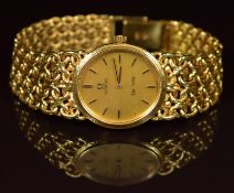 Omega De Ville 18ct gold ladies wristwatch with black hands and baton hour markers, gold dial and
