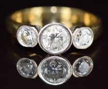An 18ct gold ring set with three diamonds of approximately 0.7ct, 0.3ct & 0.3ct, 5.2g, size Q