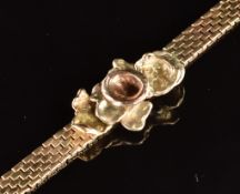A 9ct gold bracelet in the form of a flower, 26.2g, 16cm