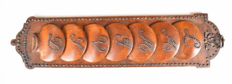 Likely French letter or similar rack with cut steel studwork decoration and letters for the days