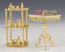 19th century carved bone possibly prisoner of war doll's house chess table with pieces together with