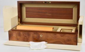 Breguet specimen wood watch display box with fitted interior, gilt fittings, outer card box and key,