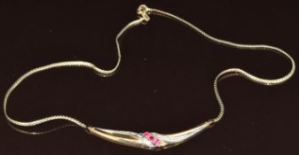 A 9ct gold necklace set with rubies and diamonds, 5.8g, 40cm