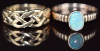 Two 9ct gold rings, one in a Celtic design the other set with an opal, 4.3g, sizes O & Q