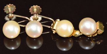 A pair 9ct gold earrings set with cultured pearls and a pair of yellow metal earrings set with