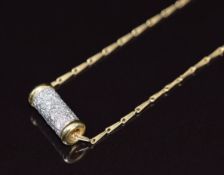 An 18ct gold cylindrical pendant set with diamonds on an 18ct gold chain, 10.4g, the chain 48cm