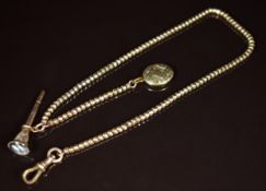 A yellow metal Albert / watch chain with locket and watch key set with banded agate, 9g, 34cm