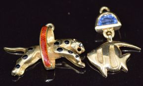 An 18ct gold pendant in the form of a fish, set with a sapphire (2g, 2cm) and a 14k gold pendant