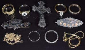 A 9ct gold eternity ring set with garnets and pearls (1.7g, size M), three silver rings, 9ct gold